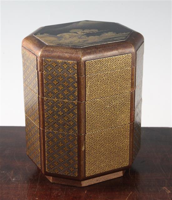 A Japanese togidashi gold lacquer jubako three tier box and cover, 18th century, 19.5cm, restorations